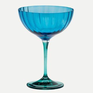 Jazzigt blått champagneglas